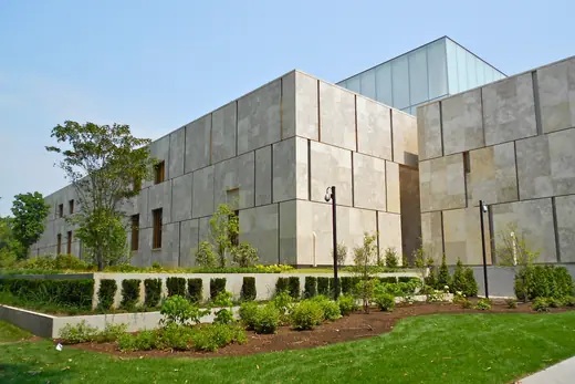 The Barnes Foundation building on the Benjamin Franklin Parkway in Philadelphia, a low stone-clad modern structure.