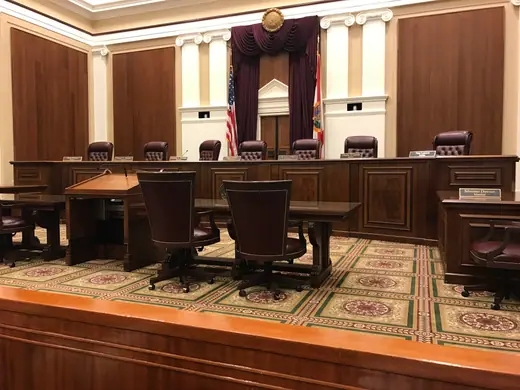 The empty courtroom of the Supreme Court of Florida, with the bench and counsel tables.