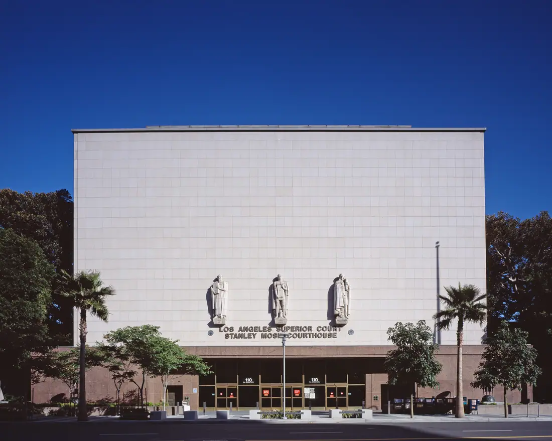 The Grand Avenue facade of the Stanley Mosk Courthouse in downtown Los Angeles, a Late Moderne building with bas-relief panels above the entrance.